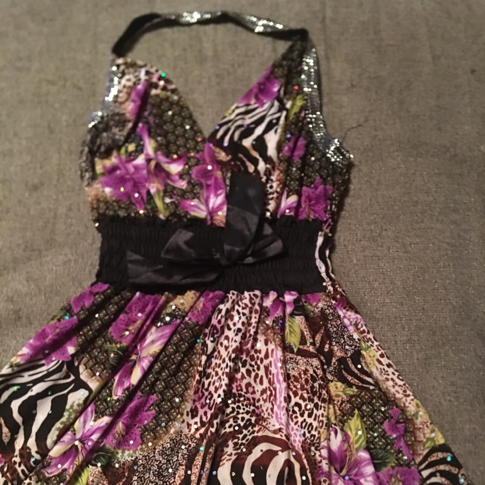 A purple floral halter neck dress